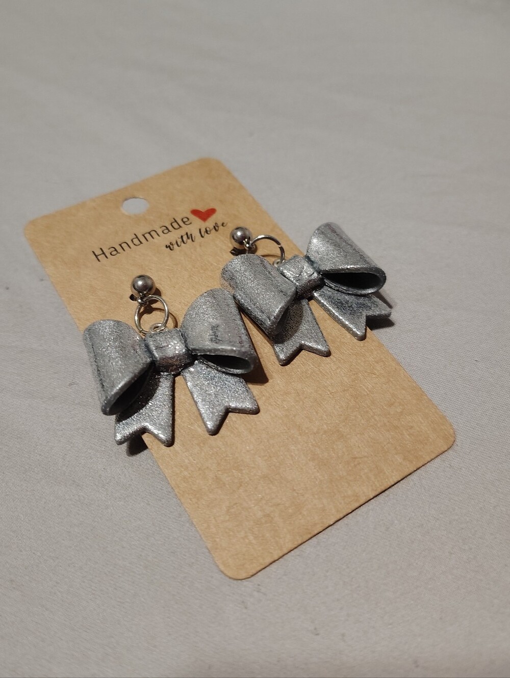 Silver Glitter Bow Dangle Earrings - Picture 2 of 4